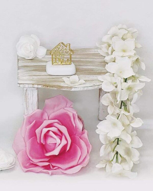 Μπομπονιέρα βάπτισης βότσαλο με επίχρυσο σπιτάκι