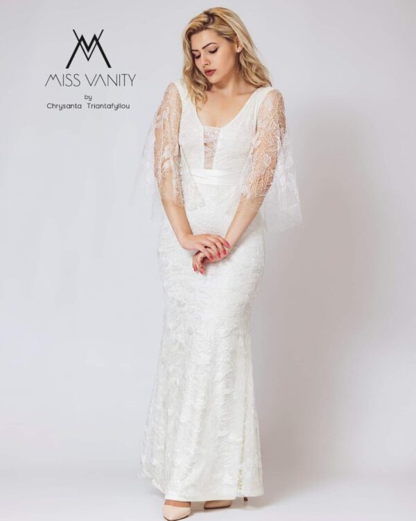 Vintage νυφικό φόρεμα με ανάγλυφη γαλλική δαντέλα. Σε γοργονέ γραμμή με διαφάνεια σε όλη την πλάτη και το μανίκι. Κανονική εφαρμογή.  Ιδανικό για πολιτικό γάμο αλλά και σε εκκλησία!