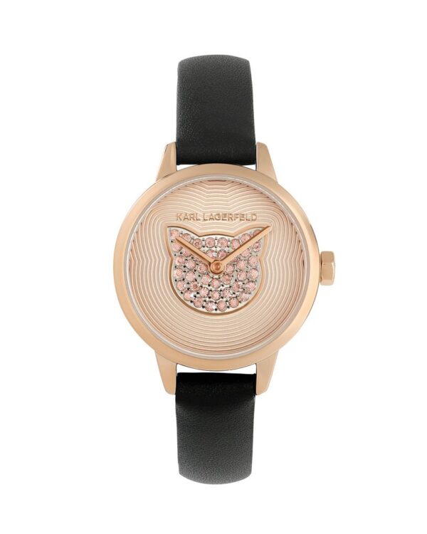 Γυναικείο ρολόι του οίκου Karl Lagerfeld, με καντράν διακοσμημένο με κρύσταλλα swarovski και γατούλα. Μηχανισμός Quartz με 2 χρόνια εργοστασιακής εγγύησης. Με δερμάτινο λουράκι, κατασκευασμένο όλο από ανοξείδωτο ατσάλι, επιχρυσωμένο με 24 καράτια για το χρυσό και το ροζ χρυσό. Διάμετρος καντράν 26mm, στεγανότητα 3 ΑΤΜ. Παραδίδεται στην γνήσια συσκευασία του με πιστοποιητικό γνησιότητας και εξουσιοδοτημένο service.