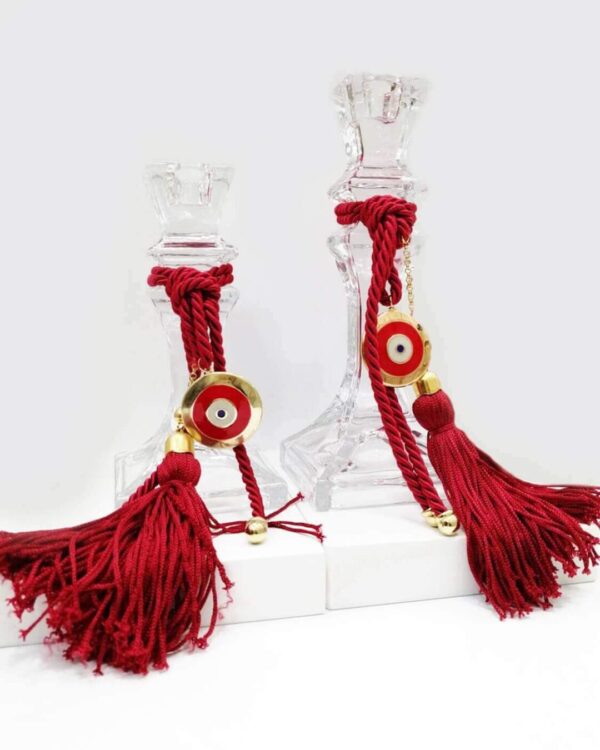 Κηροπήγια με επίχρυσο κόκκινο γούρι με μάτι