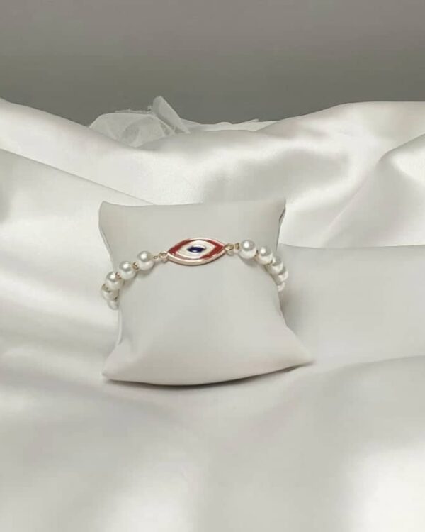 Βραχιόλι με μαργαριτάρια και μάτι με σμάλτο