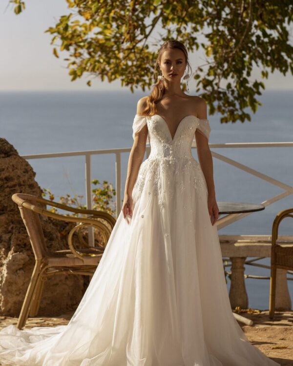 Ρομαντικό νυφικό στράπλες με γκλίτερ τούλι