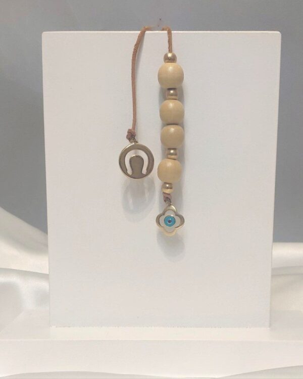 Μεγάλο μπεγλέρι με επίχρυσα στοιχεία και εκρού χάντρες