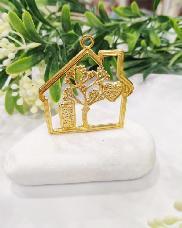 Μπομπονιέρα σπιτάκι σε τεχνητό βότσαλο