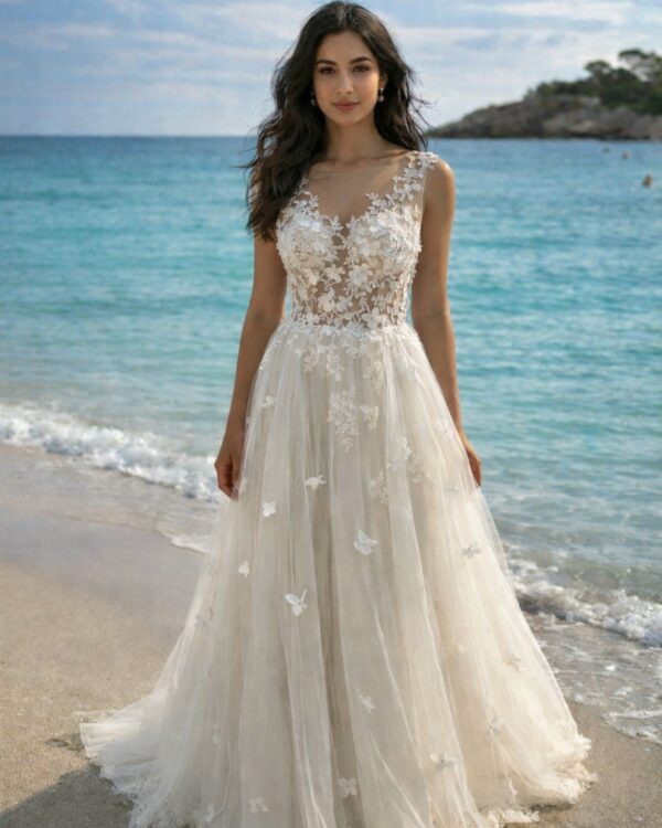 Αέρινο νυφικό, το μπούστο είναι διακοσμημένο με τρισδιάστατη δαντέλα, ανάγλυφα λουλούδια και φούστα με απαλό τούλι.