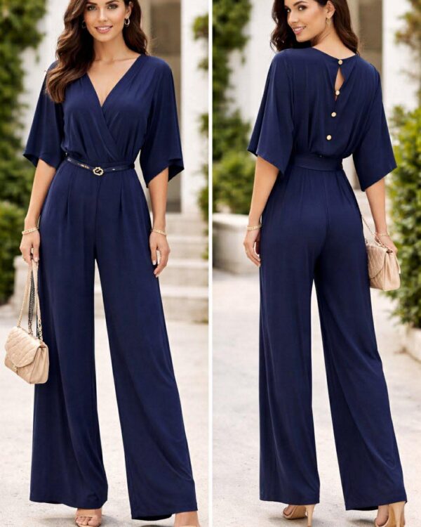 Ολόσωμη φόρμα κρουαζέ με λαιμόκοψη V, ζωνάκι στη μέση και κλείσιμο πίσω με κουμπιά