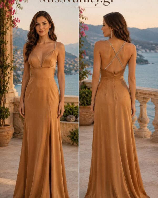Model in a bronze satin evening gown with a plunging V-neck front and crisscross back straps, standing on a terrace with the sea in the background.