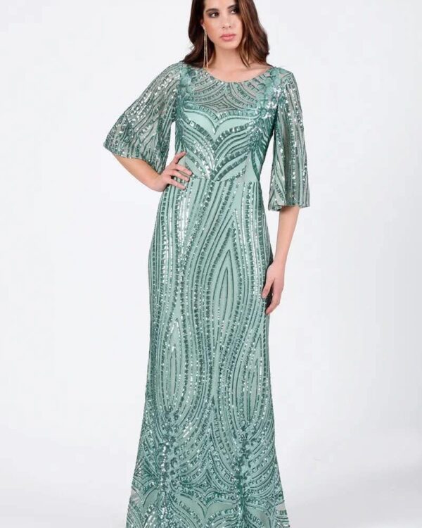Model wearing a floor-length mint green sequin gown with geometric patterns and cape-style sleeves.