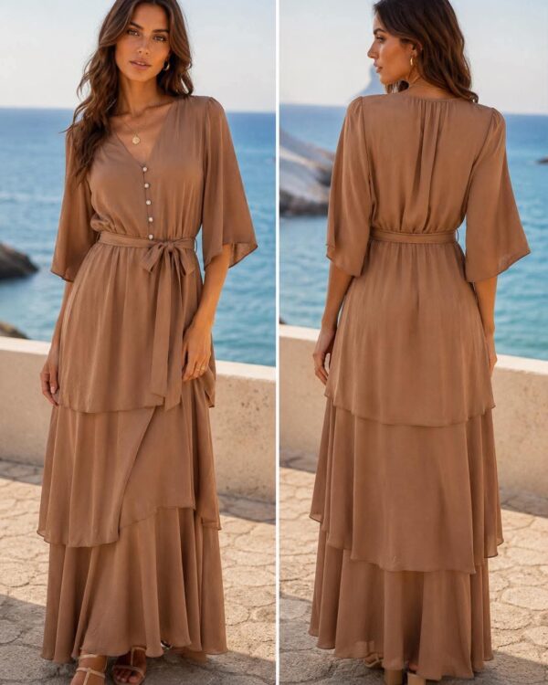 Two-panel view of a woman by the sea wearing a tan layered maxi dress with a waist tie, V-neck and button front, sandals. Front pose on the left, back view on the right.