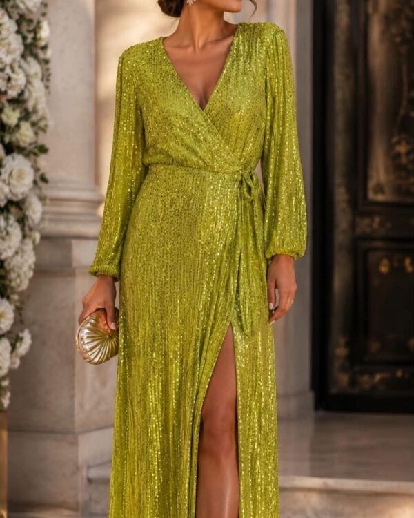 Woman in a glittering lime-green gown with a deep V-neck and high slit, holding a gold clutch at an elegant doorway.